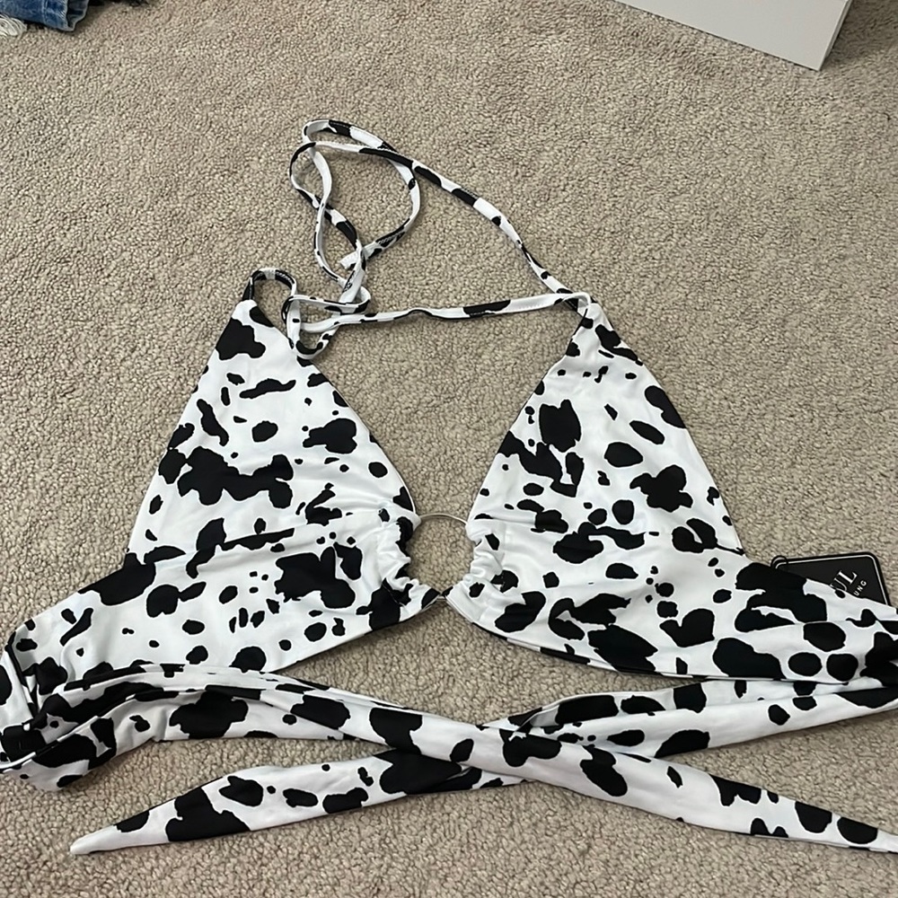 Cow print halter top and tie back.
